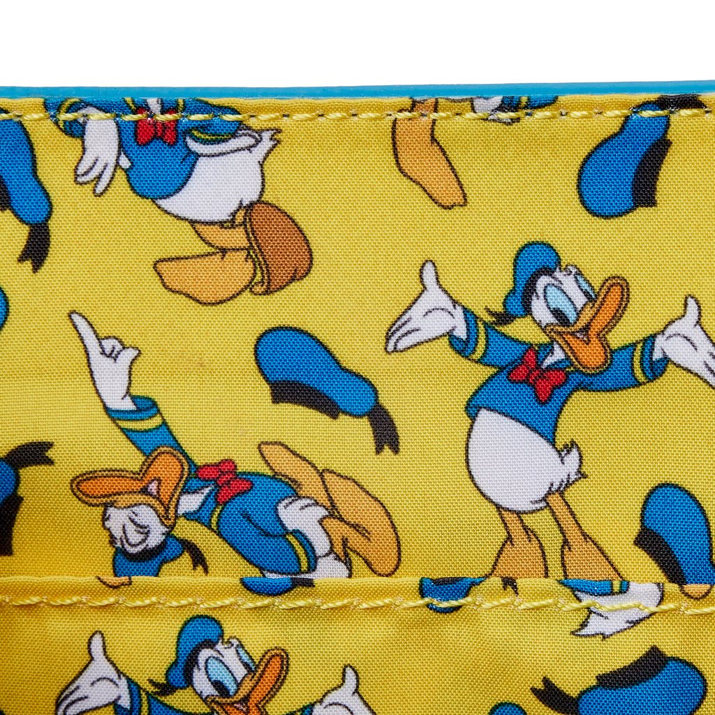 A New COACH Collection Featuring Donald Duck Is Coming to Disney Springs! |  the disney food blog