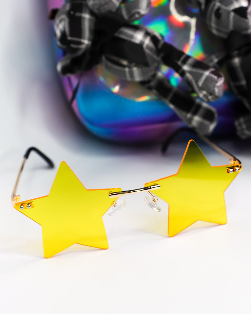 Popular schoolgirl. Carnival costume famous celebrity. Rock star. Cool kid star  shaped sunglasses. Star concept. Fame and popularity. Party holiday  celebration. Cheerful girl wear eyeglasses for fun Stock Photo - Alamy